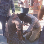 1976 pastor mitchell praying with sinner